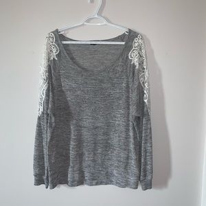 Gray long sleeve shirt with white lace shoulders